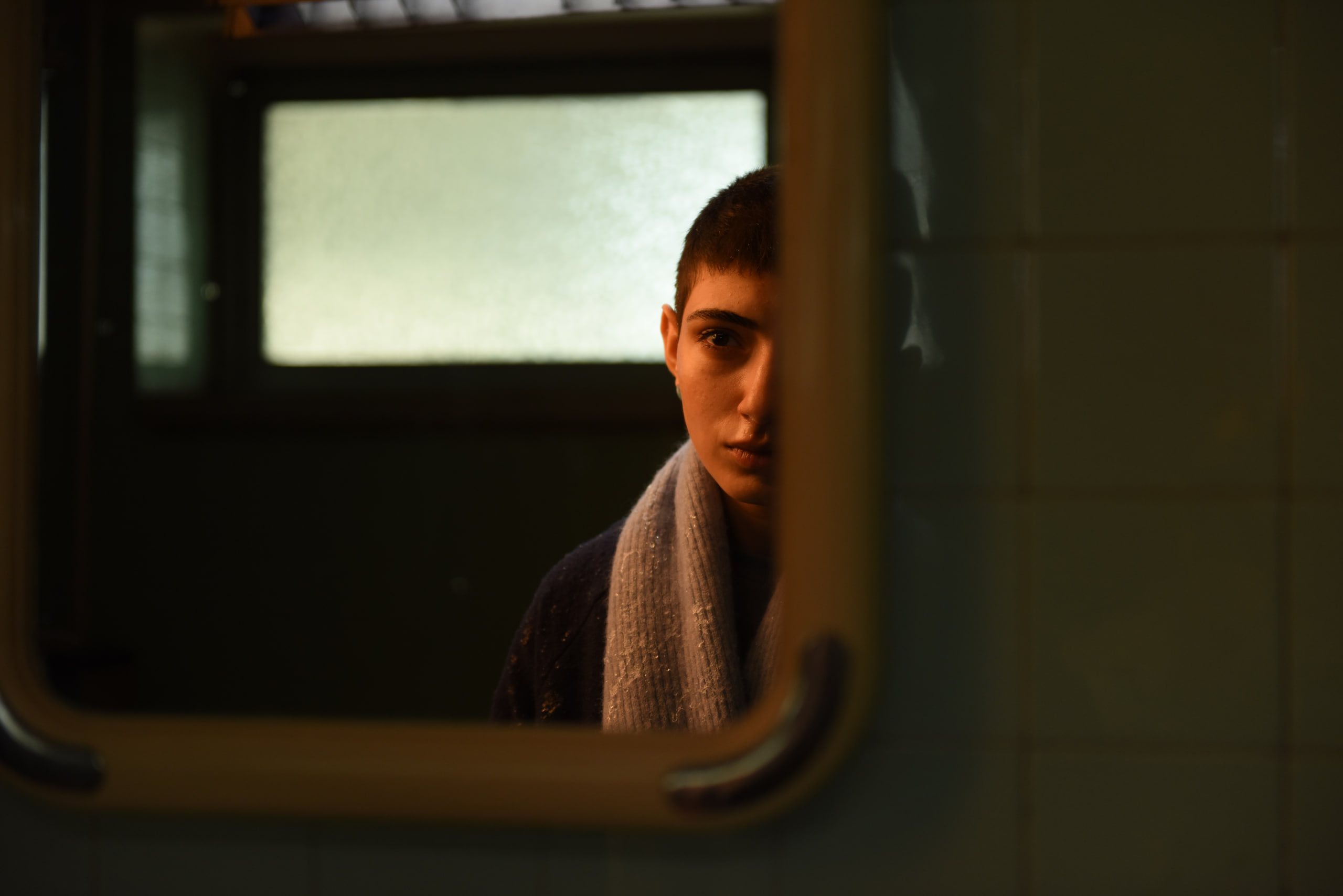 Reflection Scene Actress looking into a mirror reflection